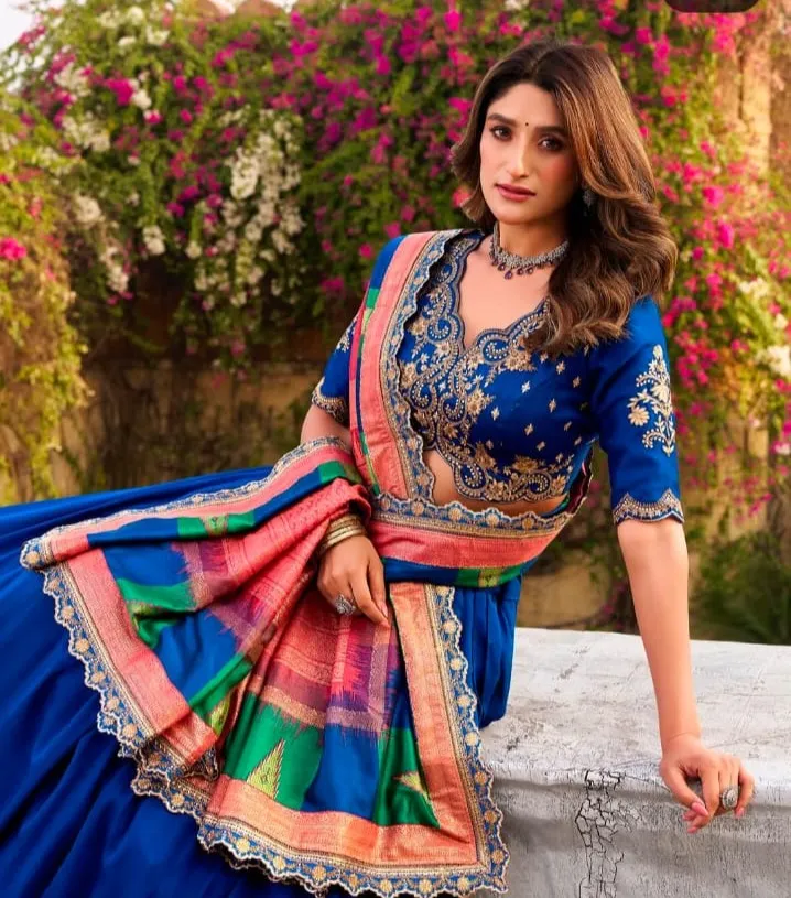 When detailed thread embroidery meets soft shimmer on Vichitra silk - a perfect lehenga choli for weddings & festivals