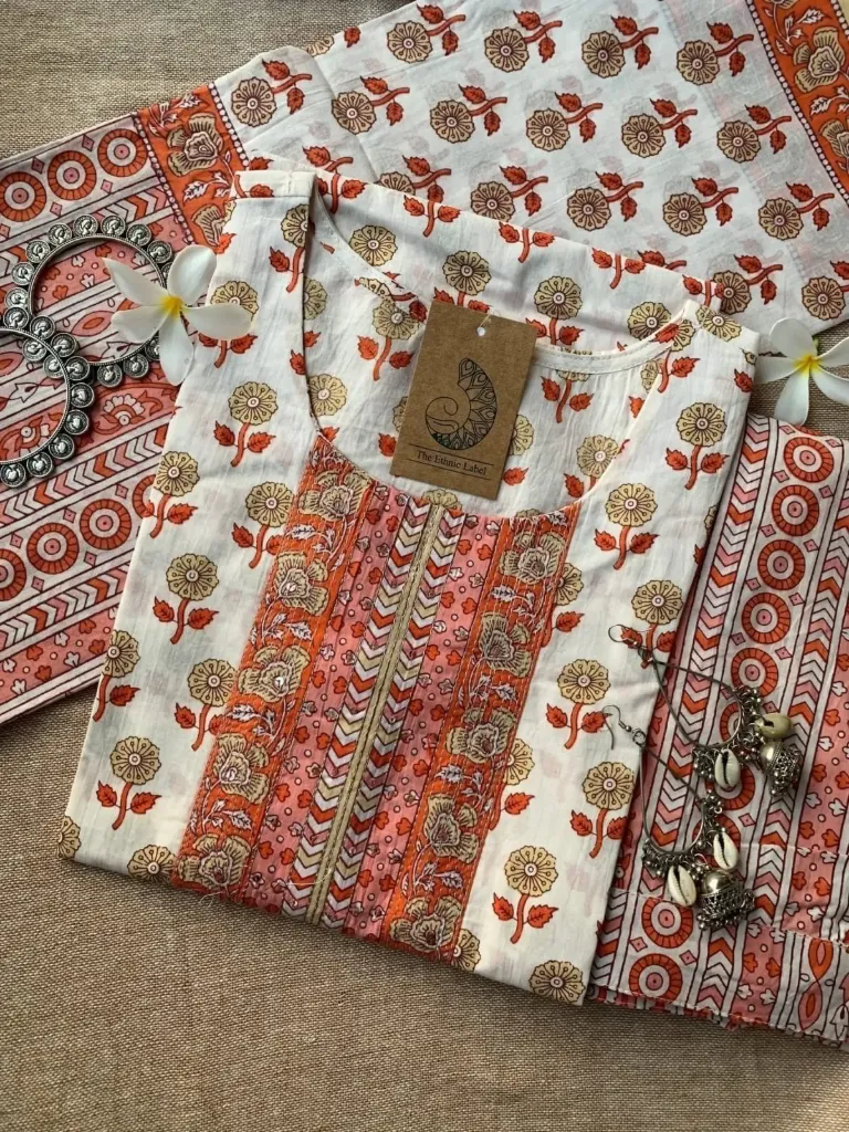 Embrace Breezy Elegance with our Peach Floral Hand-Block Kurta Set