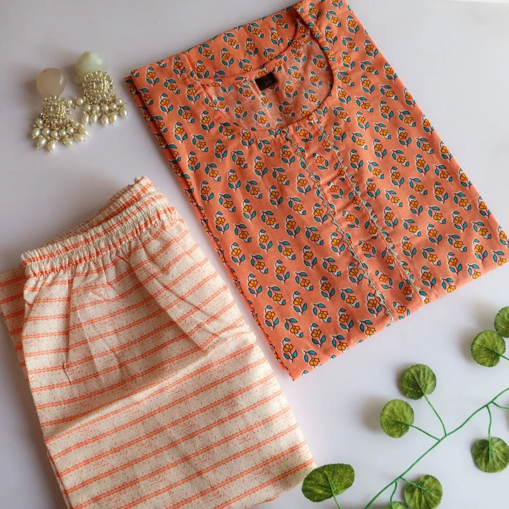 Brighten Your Everyday Style with our Orange Floral Hand-Block Kurti Set